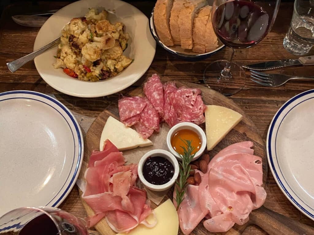 A charcuterie board on a table in Montesacro