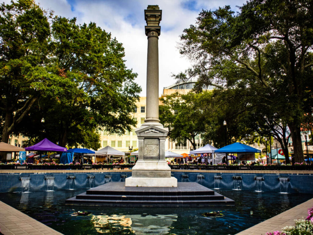 A monument on the pool at James Weldon Johnson Park
