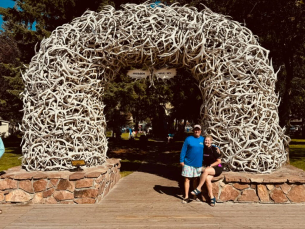 The author Morri Stewart and her partner posing for a photo at the Antler Arches