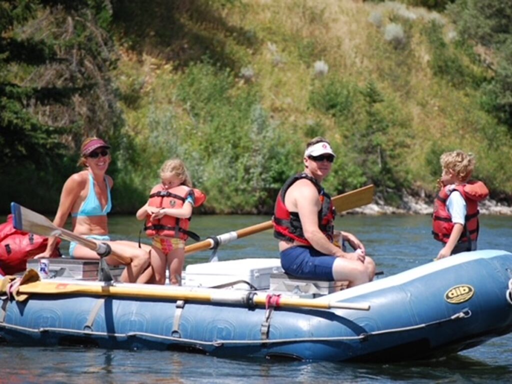 The author Morri Stewart and her family rafting on the Snake River