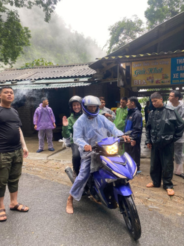 The author's partner riding a motorbike