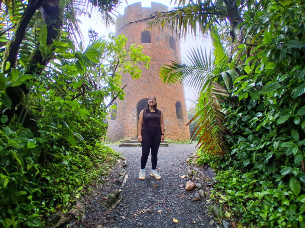 The author, Vanessa Ramos in front of a tower at Mount Britton
