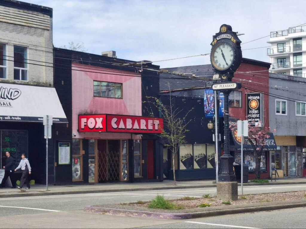 View of the iconic clock and the exterior of Fox Cabaret in Mount Pleasant