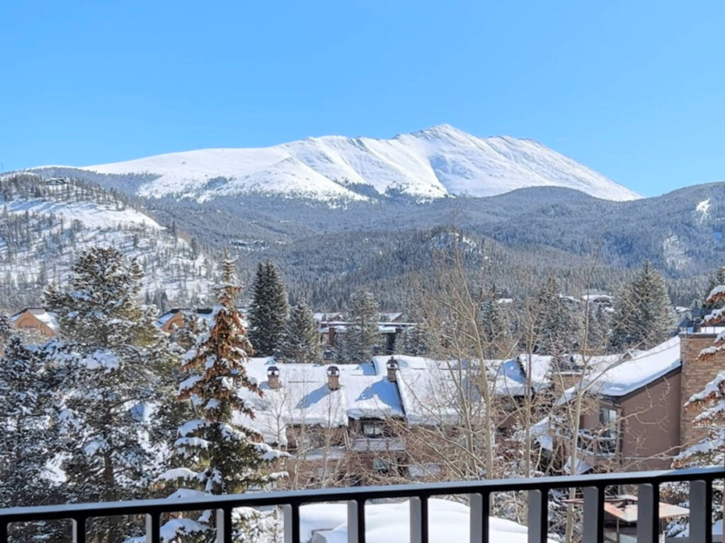 Scenic snowy mountain views from the balcony of Hotel Alpenrock