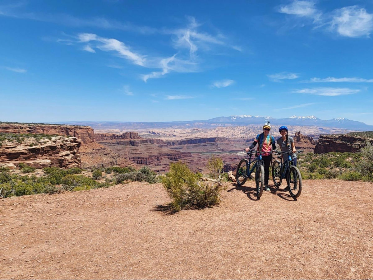 Travel Lemming editor Abigail and her friend mountain biking at Dead Horse Point State Park
