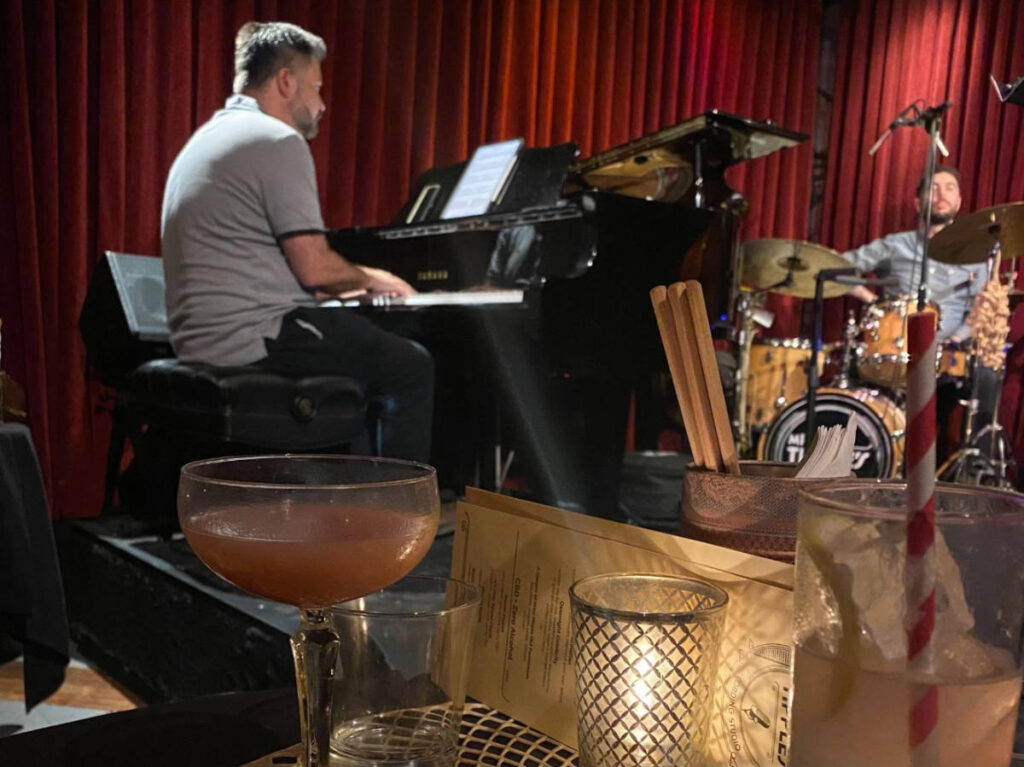 Musicians performing in Mr. Tipple’s Recording Studio