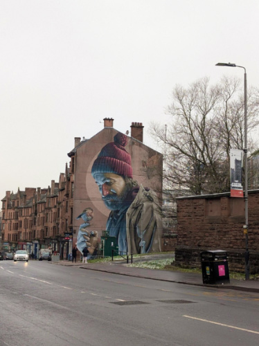 A mural on the brick walled building in Glasgow