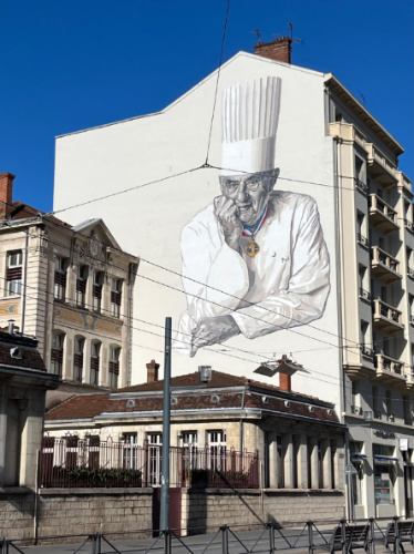Mural of Paul Bocuse on a building