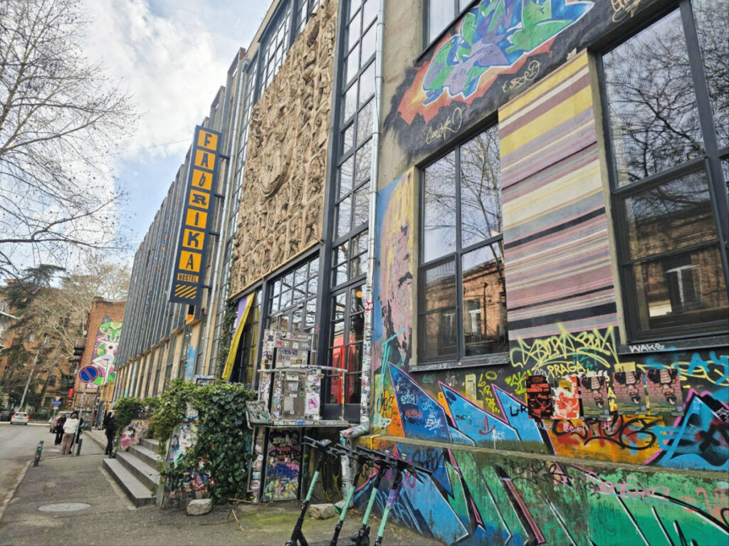 Colorful buildings with murals in Fabrika