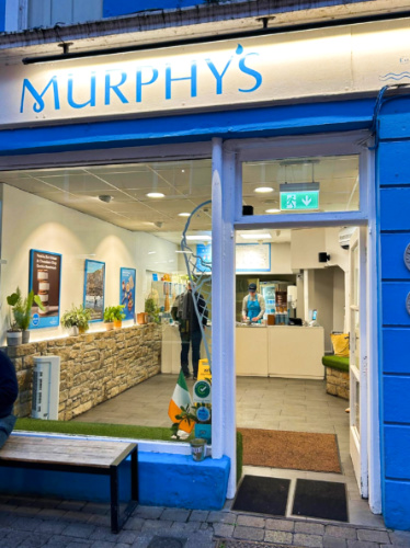 The vibrant blue storefront of Murphy’s Ice Cream