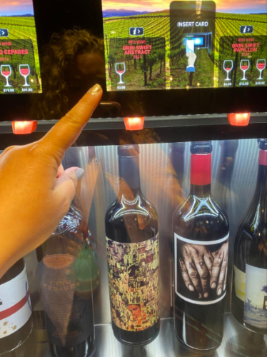 Choosing a wine at Napatini Bistro and Wine Bar