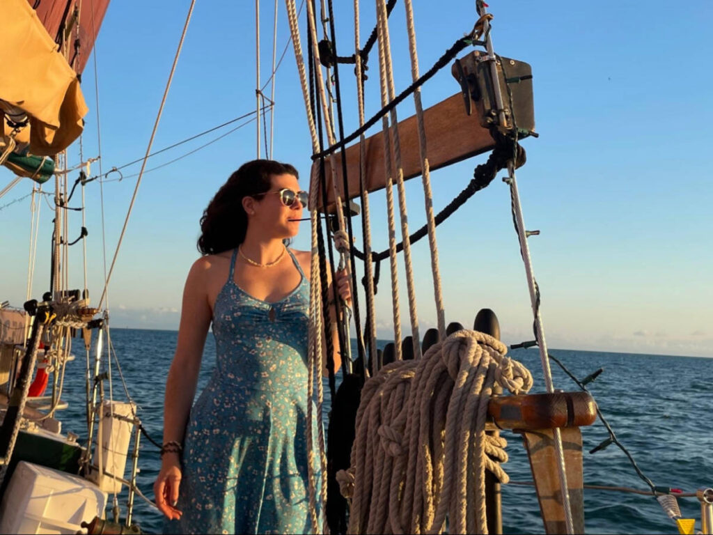 The author Natalie Becerra admiring the view from the Sunset Sail Schooner in Key West