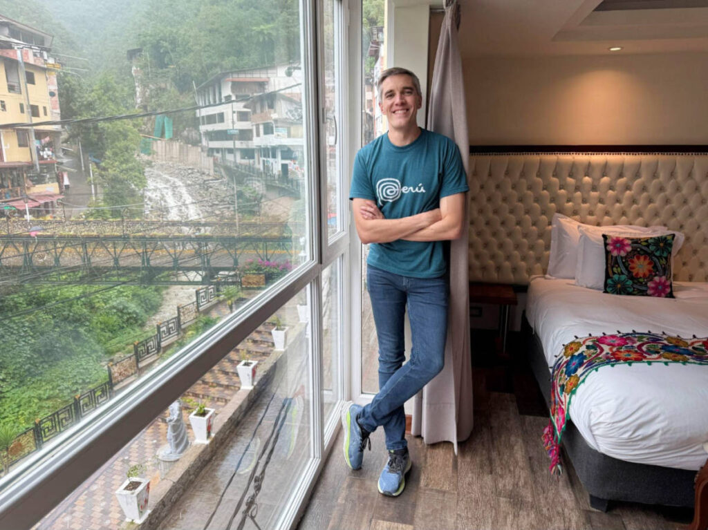 The author, Nate Hake, on their room at Jaya Machu Picchu Boutique Hotel with a view