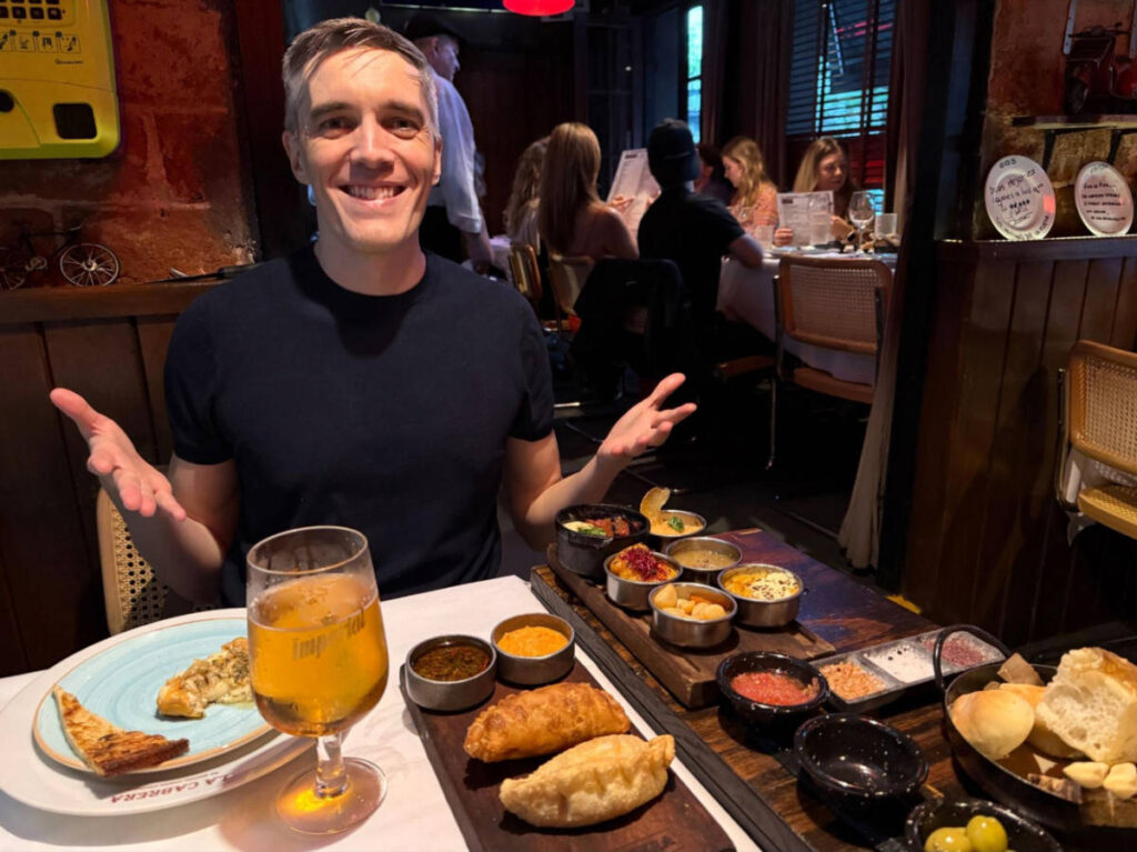Travel Lemming founder, Nate Hake, enjoying the Argentinian food at La Cabrera