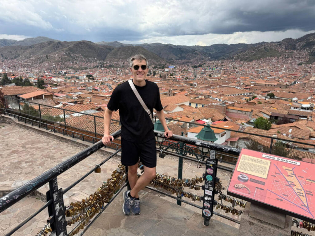 Travel Lemming founder Nate Hake, standing at the Mirador de San Blas with an overlooking view of the Historic Center