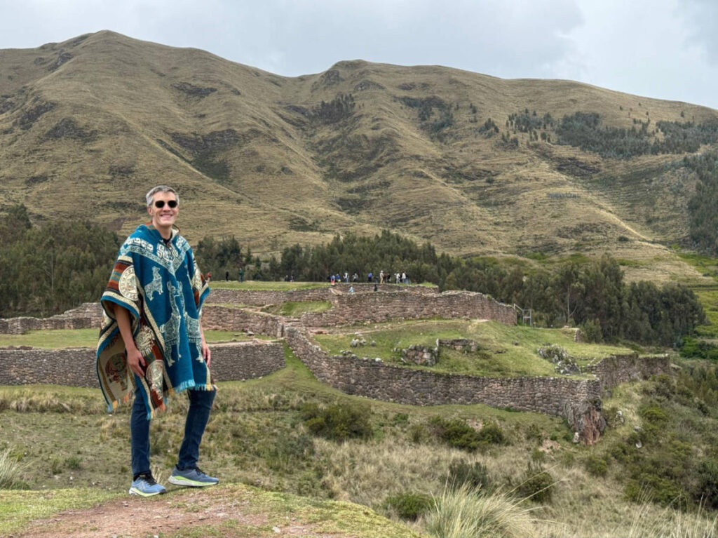Travel Lemming Founder Nate Hake, in front of the ruins at the Puka Pukara fortress