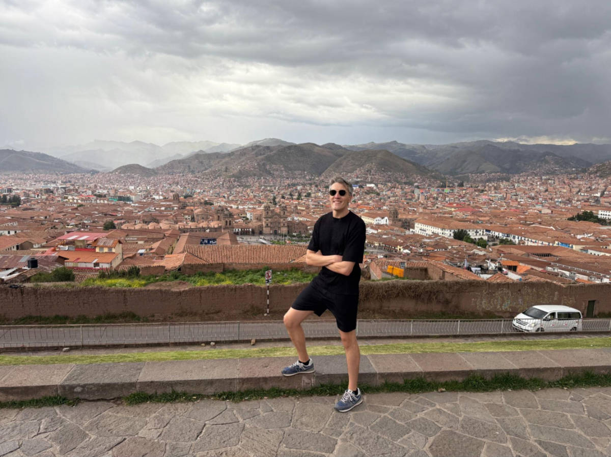 Travel Lemming founder Nate Hake, posing for a photo in front of the San Cristobal Viewpoint