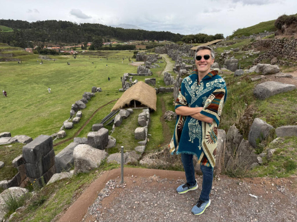 Travel Lemming founder Nate Hake, posing for a photo at the Saqsaywaman archaeological site