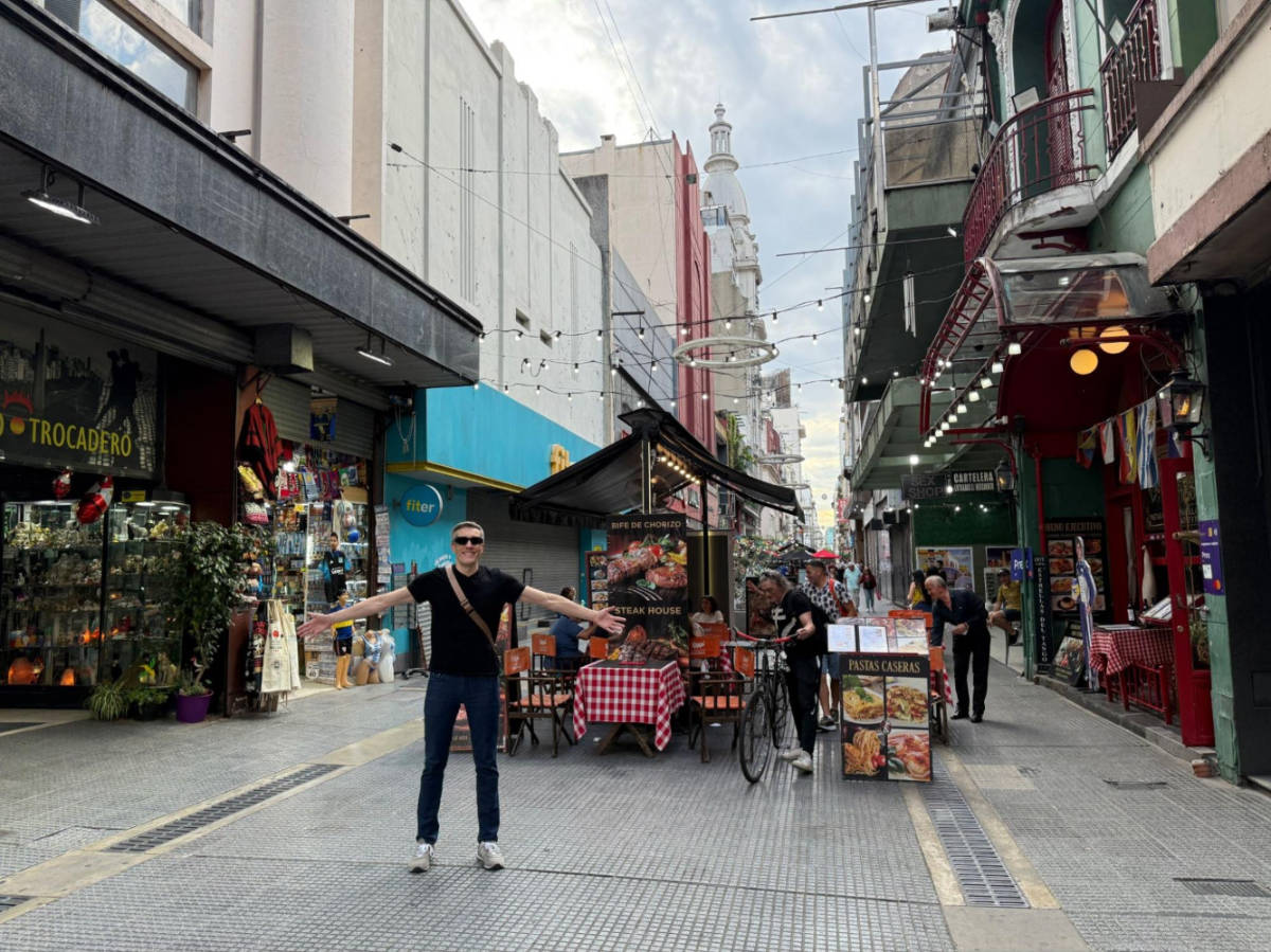 Travel Lemming founder, Nate Hake, standing at the bustling pedestrian shopping streets