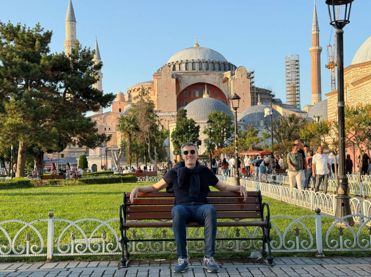 Travel Lemming founder Nate Hake sitting in front of the Hagia Sophia