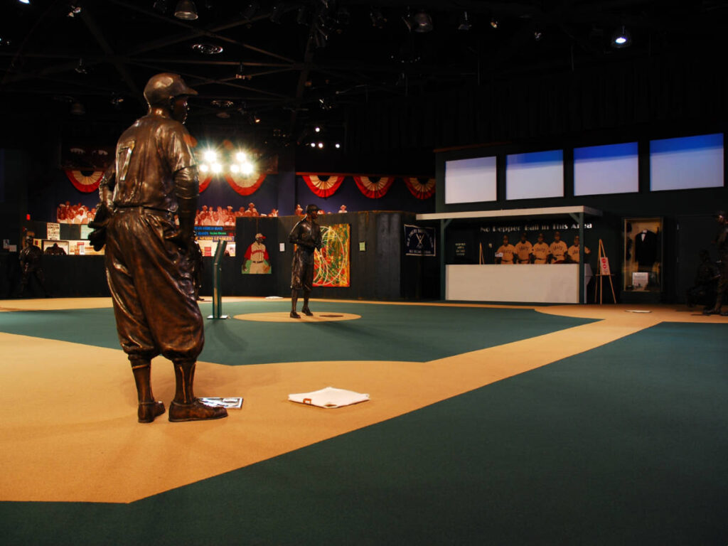 View of the displays and sculptures inside the Negro Leagues Baseball Museum