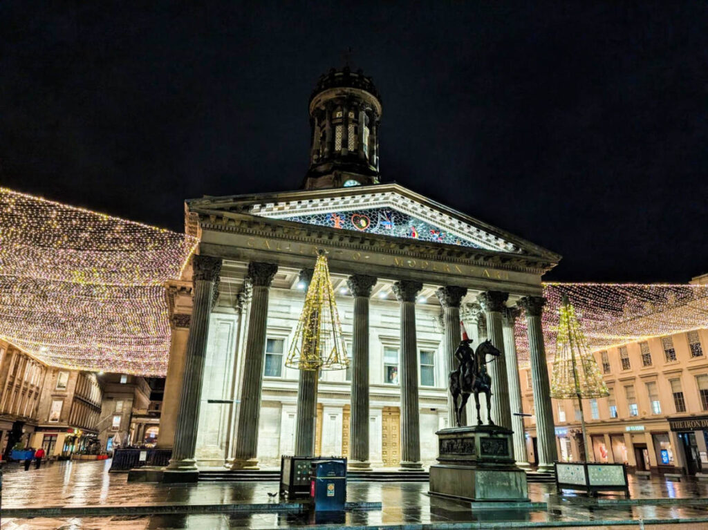 View of the string lights and exterior of neo-classical Gallery of Modern Art illuminated at night