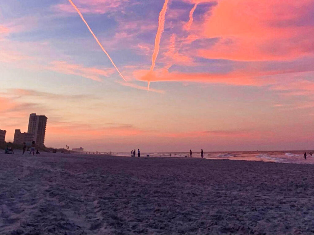 Scenic sunset view over the skyline and Neptune Beach