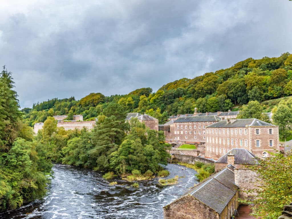 Overlooking view of New Lanark and the flowing River Clyde