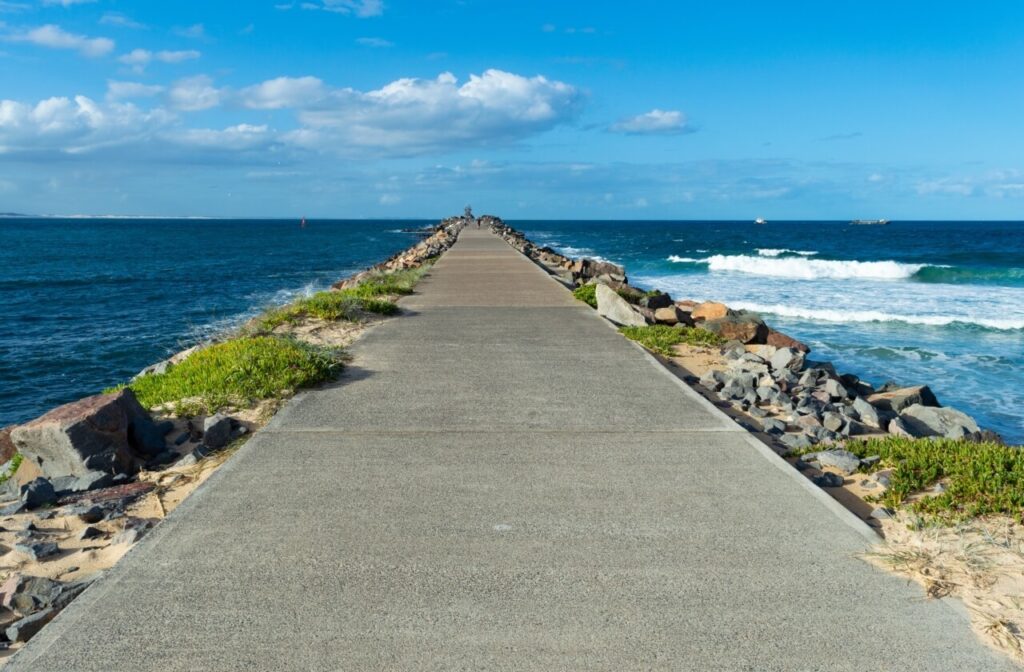 Walkway leading to ocean at Newcastle Breakwater