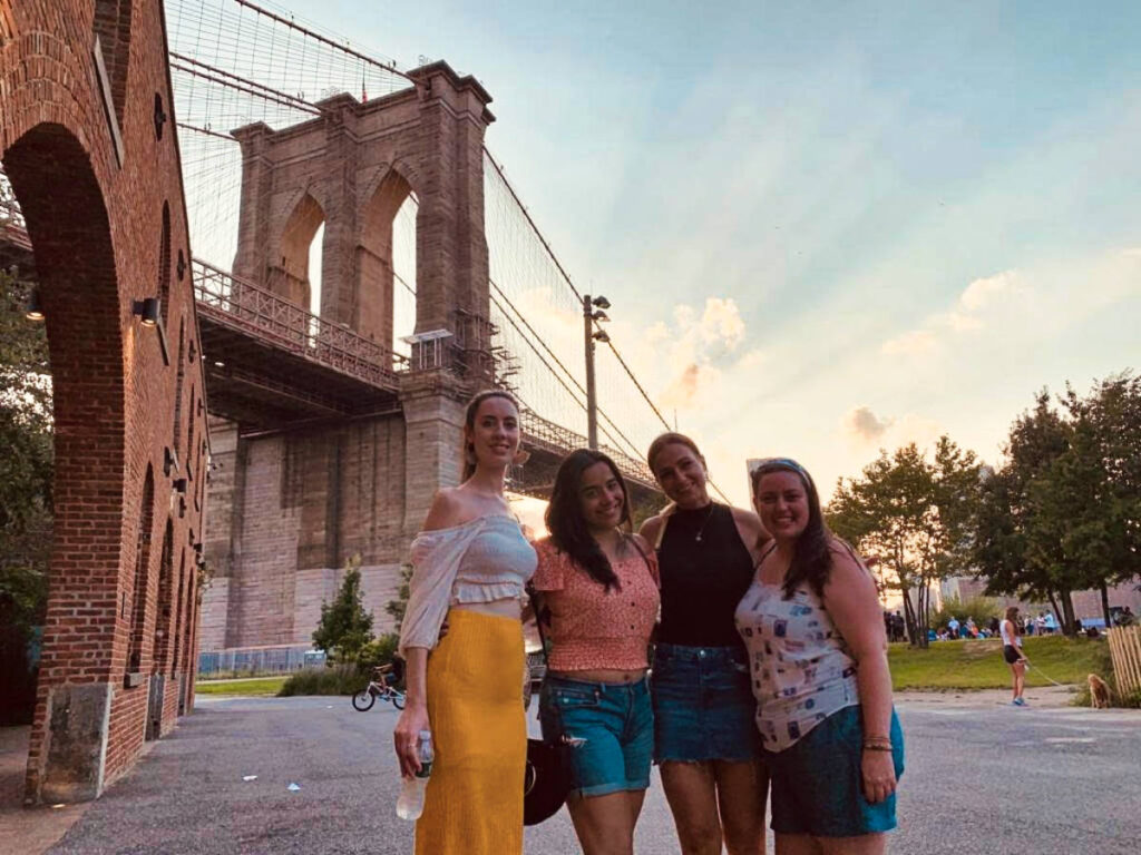 The author Niamh Hayes and her friends in front of Manhattan Bridge