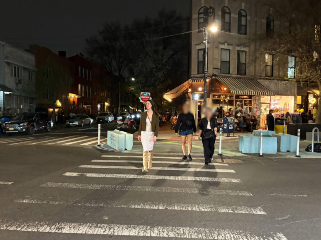 The author Niamh Hayes, crossing the pedestrian lane in Williamsburg at night