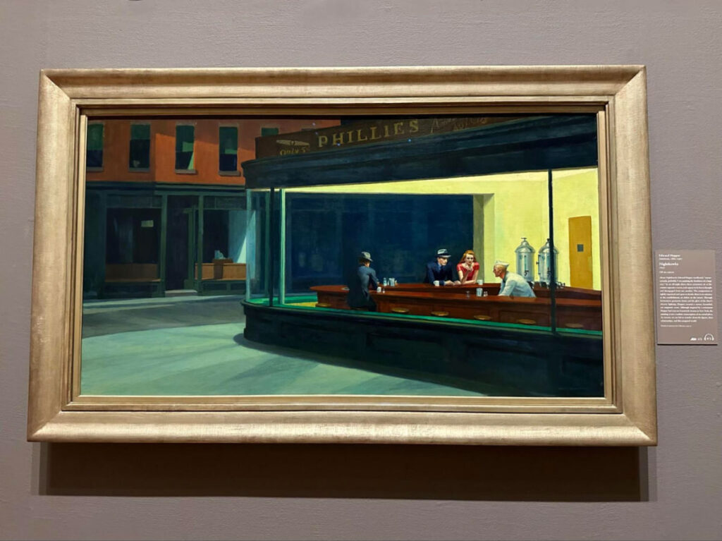 The Nighthawks by Edward Hopper painting on display