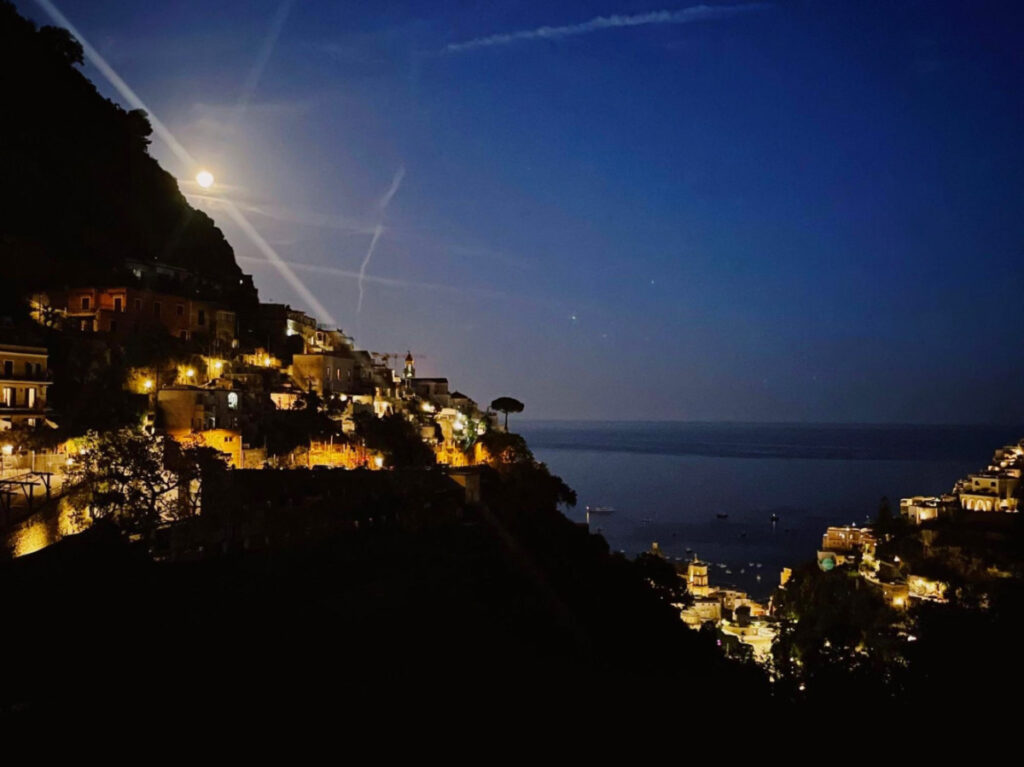 Nighttime views from a cliffside bed and breakfast in Italy