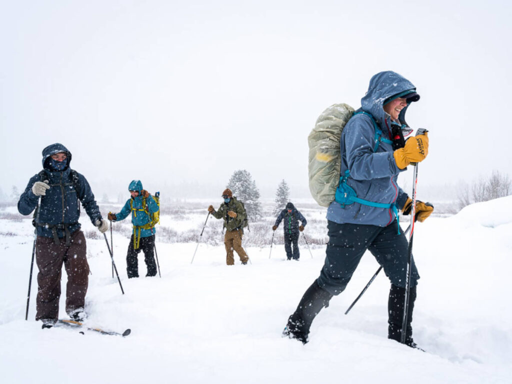 Nordic skiers during a snowy day in Grand Teton National Park