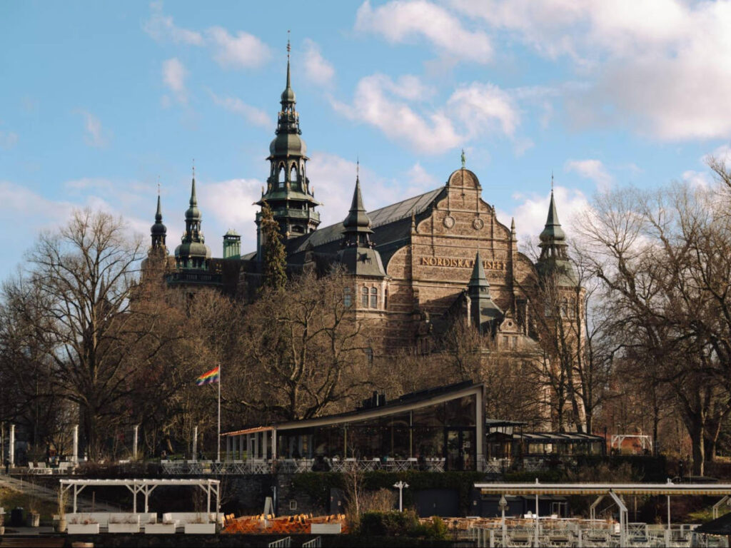 View of the granite facade with high gables and spires of Nordiska Museet