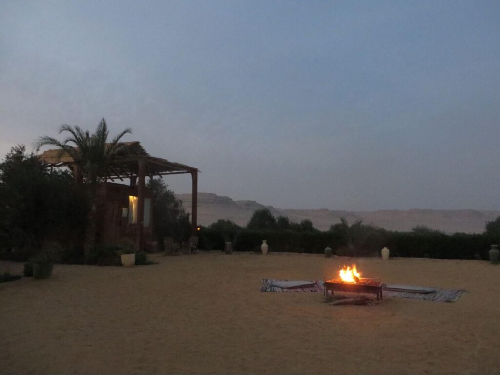 A fire pit burning in the courtyard of Northern Lake Lodge