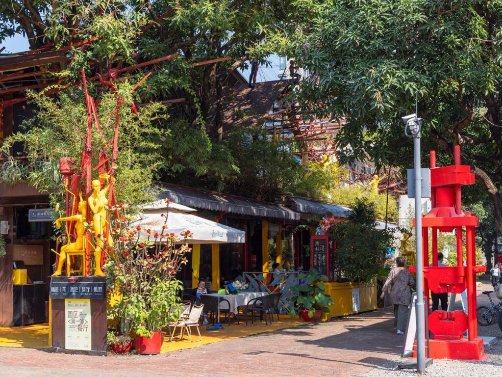 View of a modern art installation outside a restaurant in the OCT Loft complex