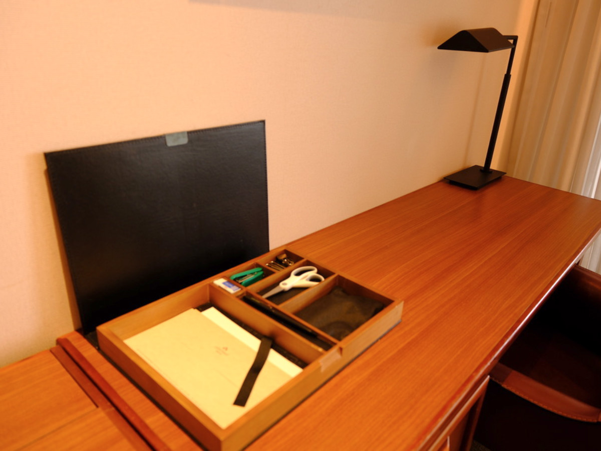An organizer full of office supplies in the room in Eslite Hotel