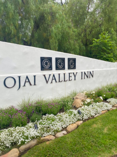 Ojai Valley Inn signage surrounded by picturesque landscapes