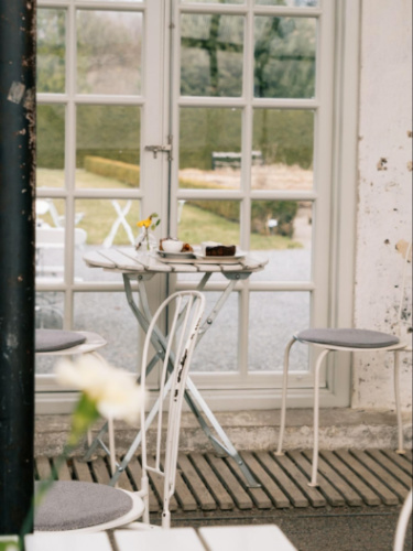 A small table by the window in Old Orangery