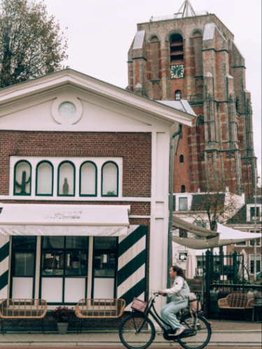 The Oldehove tower behind restaurant STEK