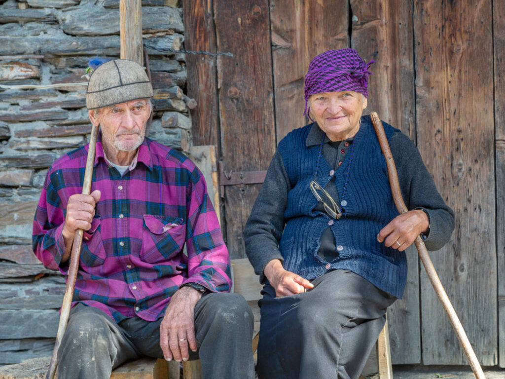An elderly couple smiling for a photo in Georgia