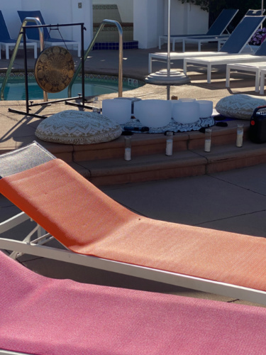 View of the seating area around the poolside of Omni La Costa Resort & Spa