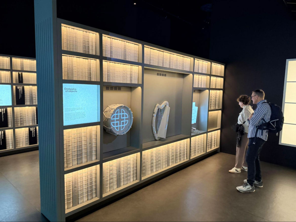 A couple looking at the Orchestra of Objects display
