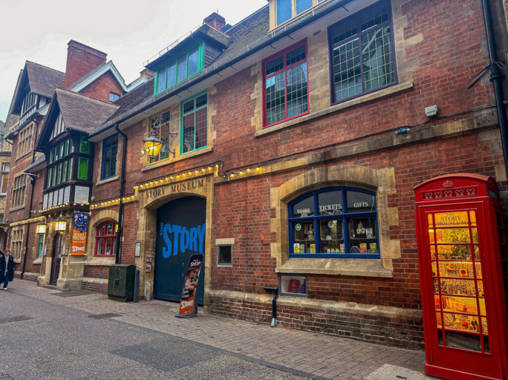 View of the brick walled and vibrant exterior of the Story Museum