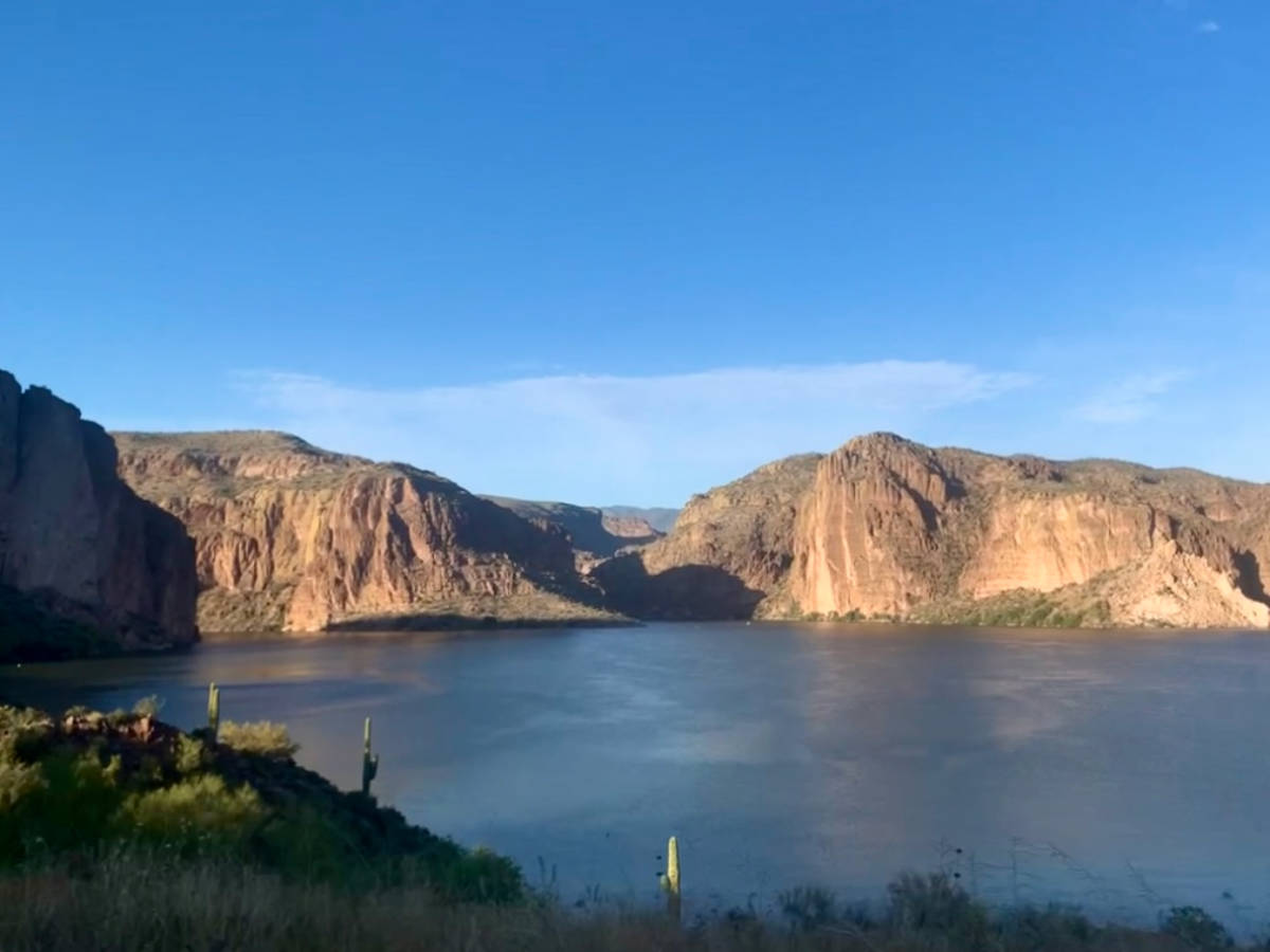 Overlooking view of the Canyon Lake surrounded by mountain valleys