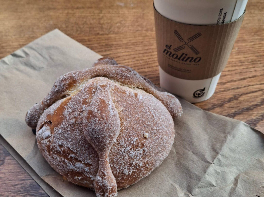 Closeup look of the Pan de Muerto and a drink