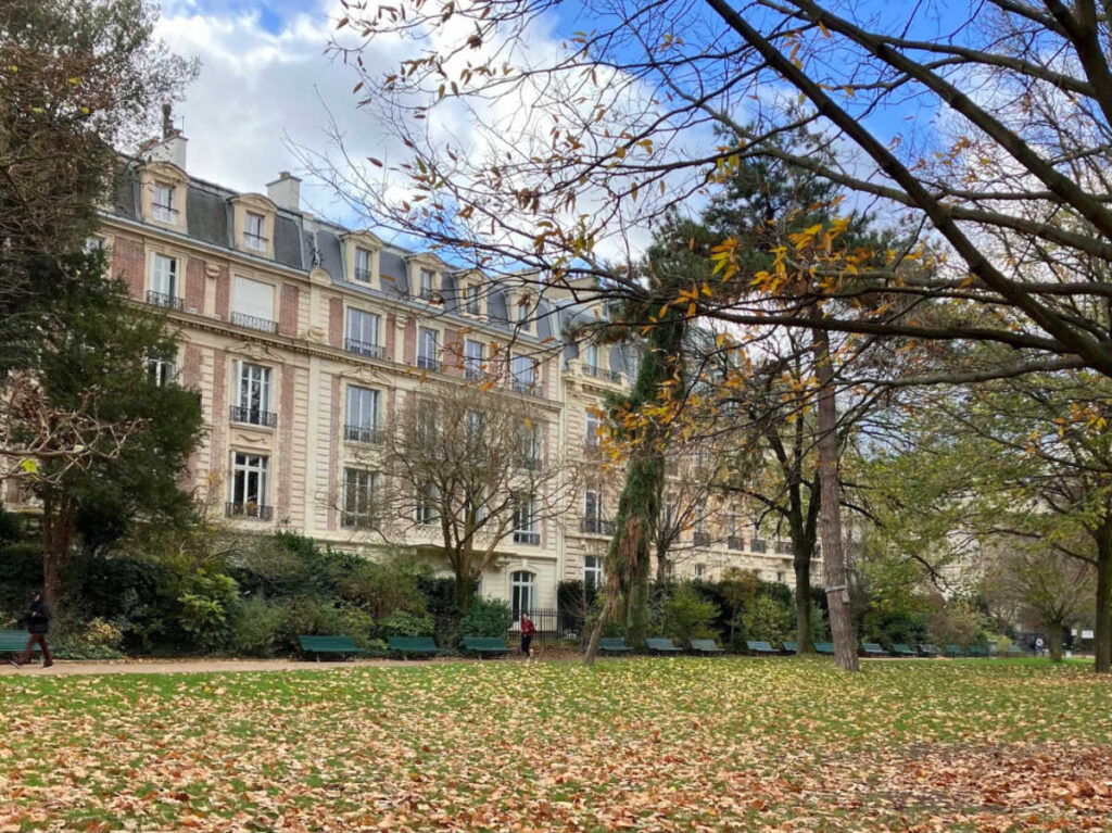 The apartment buildings surrounded by greenery at Parc Monceau