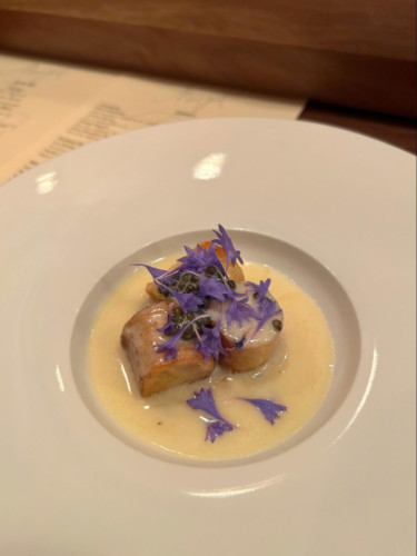 A Parisian gnocchi served on a plate at Margot