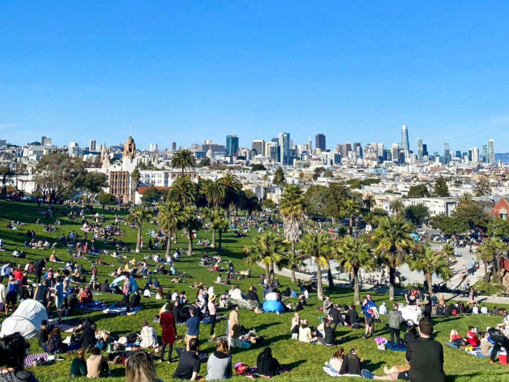 View of the park-goers chilling at Mission Dolores Park